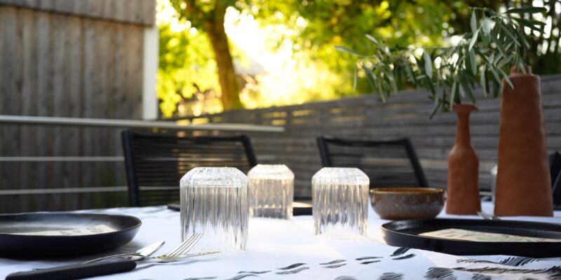 a table with plates and utensils on it