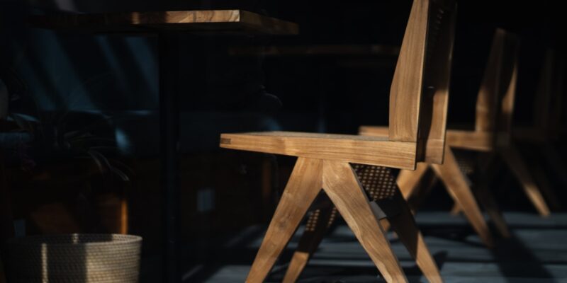 brown wooden chair on black wooden floor