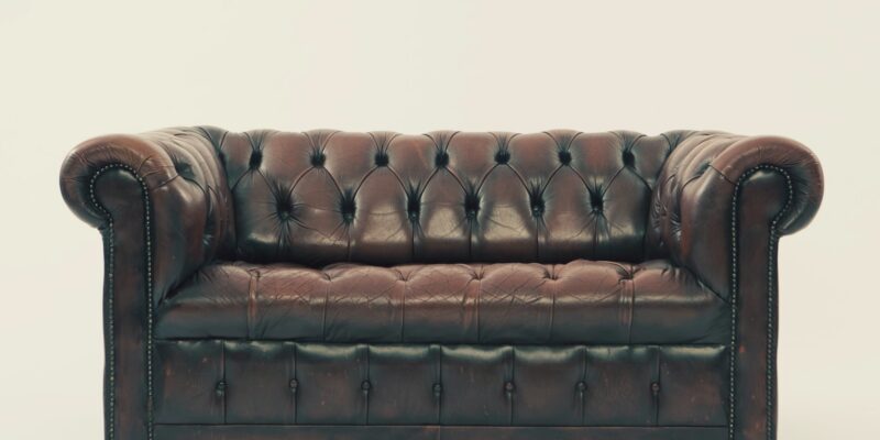 brown leather Chesterfield sofa